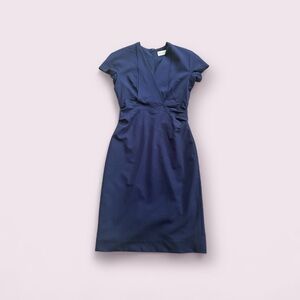 Nearly brand new M.M. Lafleur size 4 dark blue cap sleeve dress.
